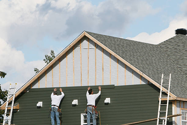 Professional Storm Damage Siding Repair technician working in Boyers, PA